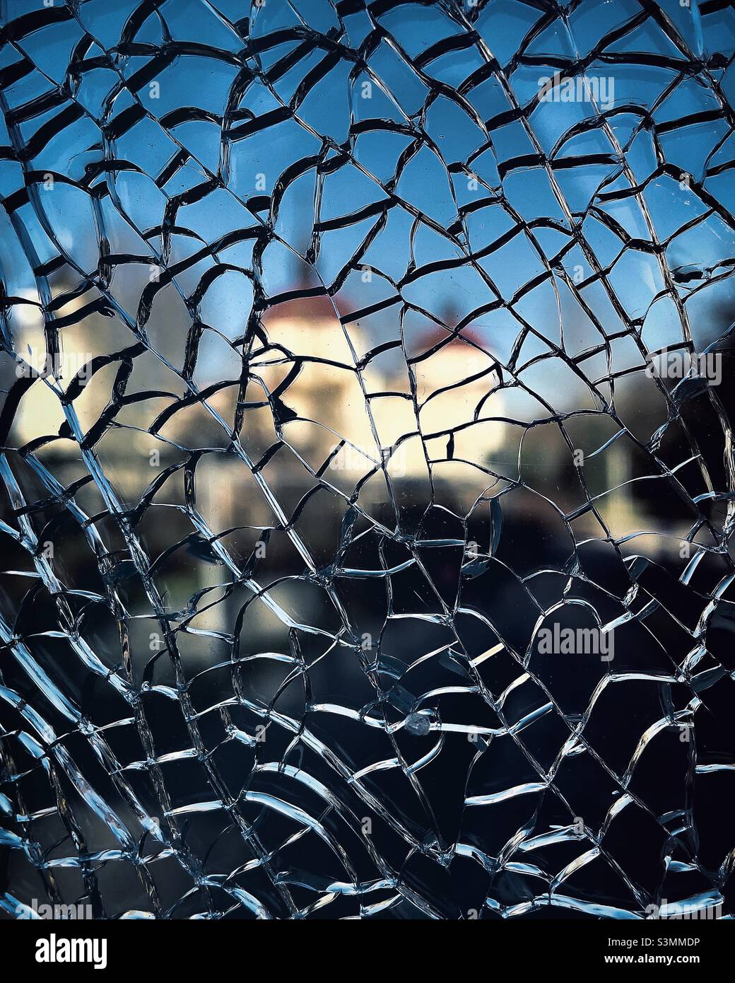 Local church building seen through shattered glass Stock Photo