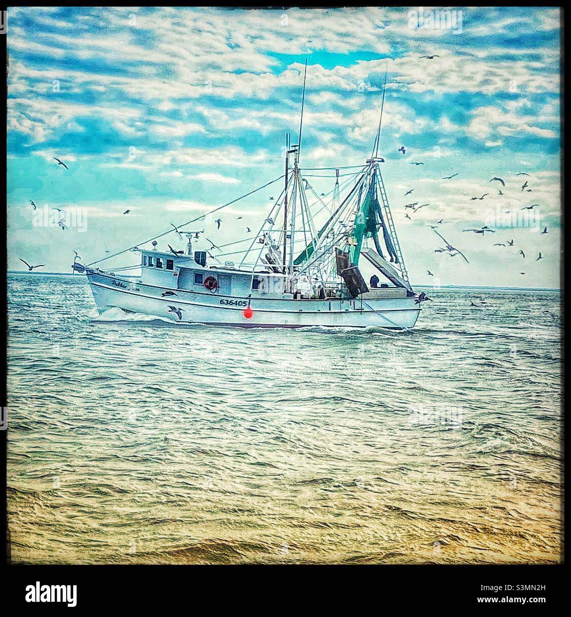 Fishing boat on the Atlantic ocean Stock Photo