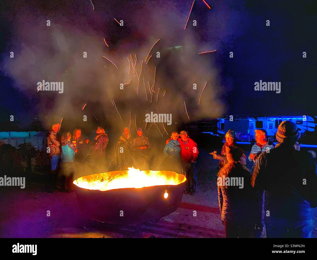 Giant fire with sparks rising up from the flames Stock Photo