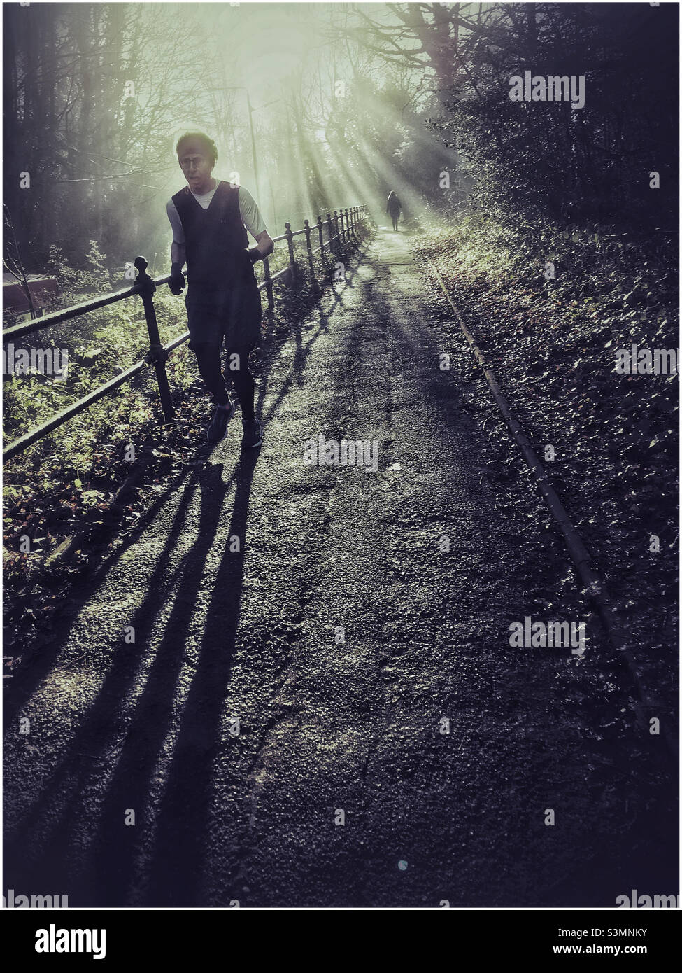 Early morning runner near Hampstead Heath, London - Smartphone Captured Stock Image