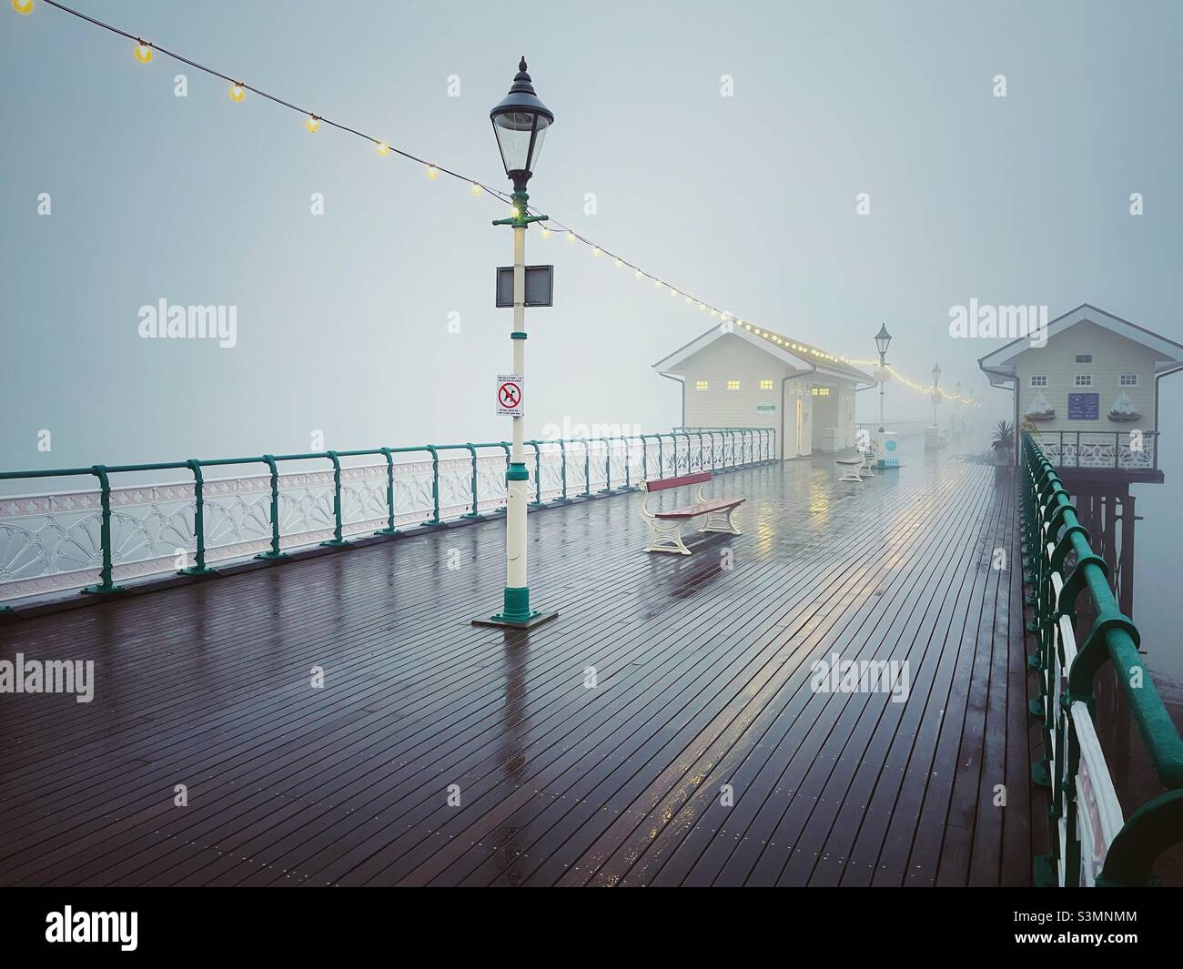 Penarth pier, South Wales, on a cold, misty January morning. Stock Photo