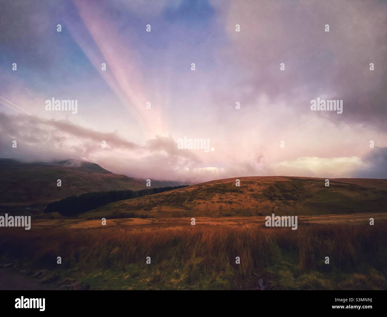 A landscape photograph of a rural Wales mountain view on a foggy morning - Smartphone Captured Stock Image