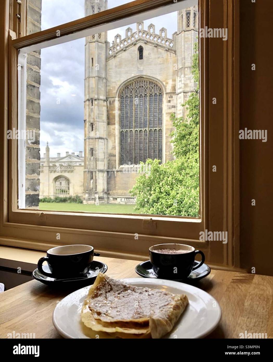 Breakfast with view of Kings College Chapel Cambridge UK England - Smartphone Captured Stock Image