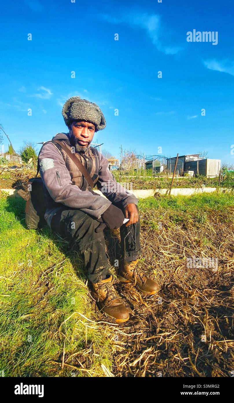 Allotment grower at rest. - Smartphone Captured Stock Image