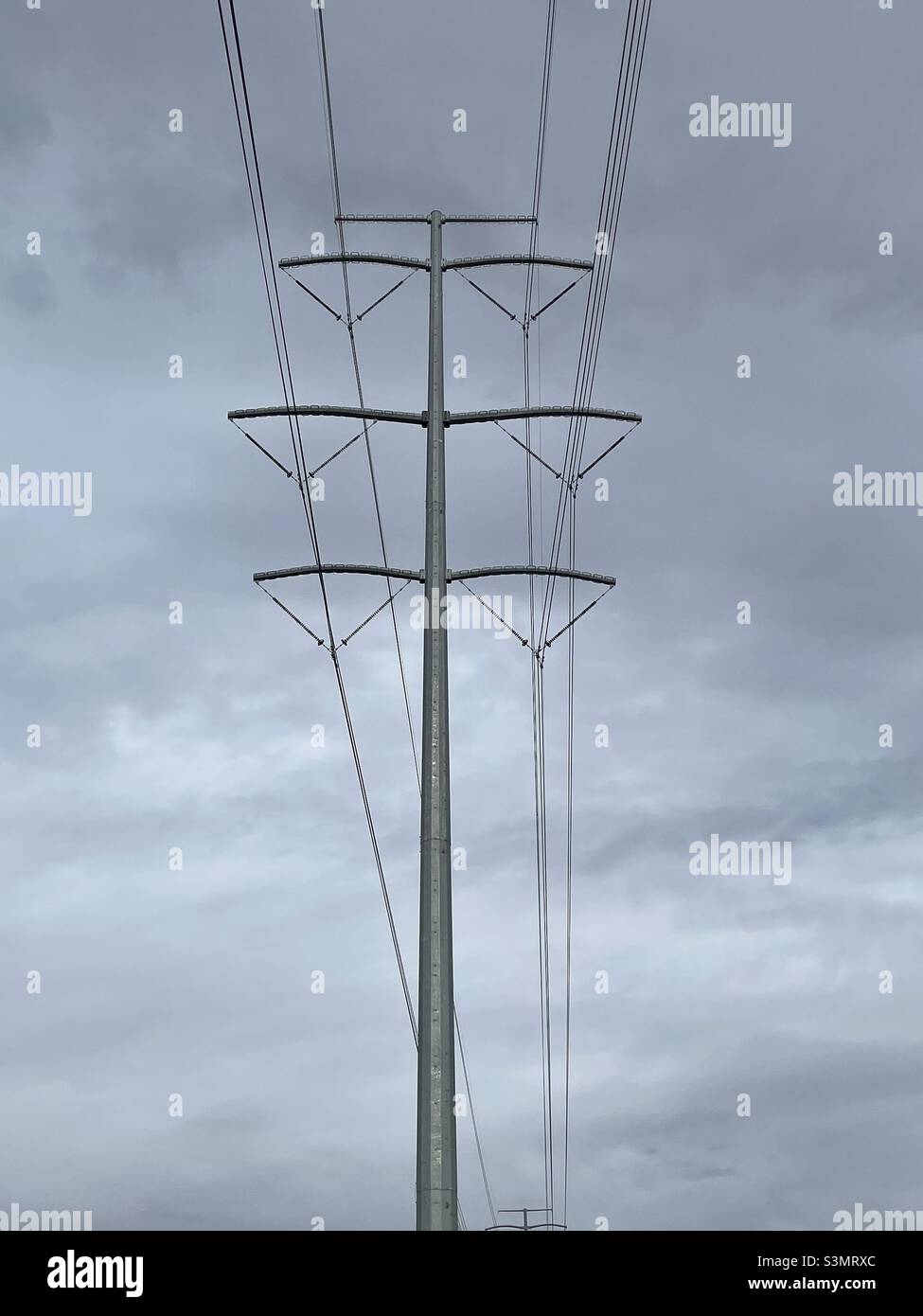 High tension power lines on the west side of the Salt Lake valley, Utah, USA. Stock Photo