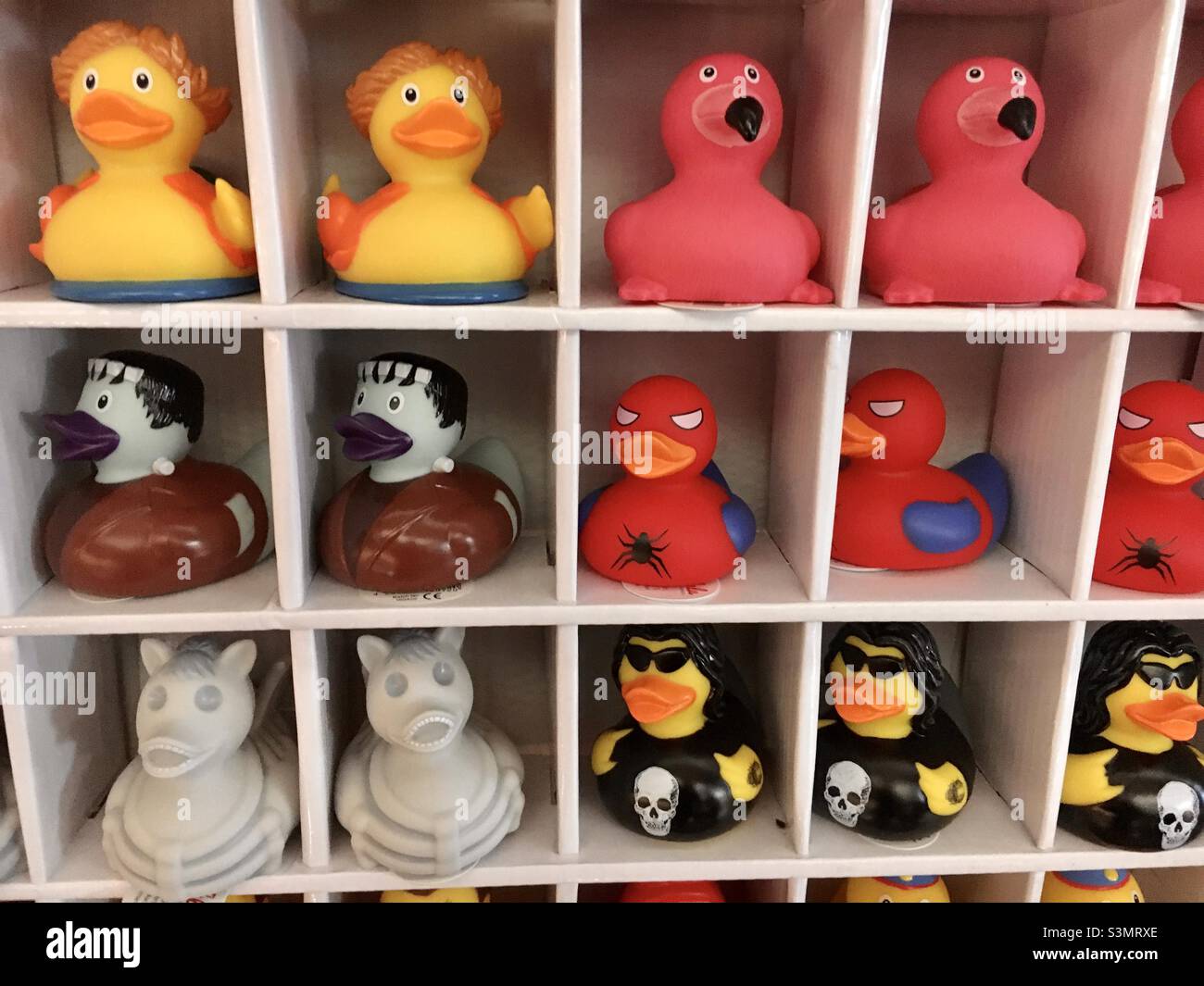 Colorful rubber ducks on the shelf Stock Photo Alamy