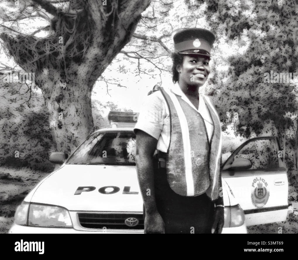 A smiling police woman in Jamaica. - Smartphone Captured Stock Image