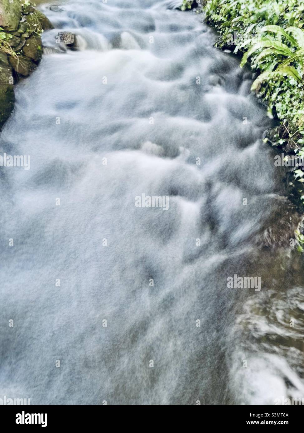 Long exposure image of the river in Pembrokeshire West Wales UK Stock Photo