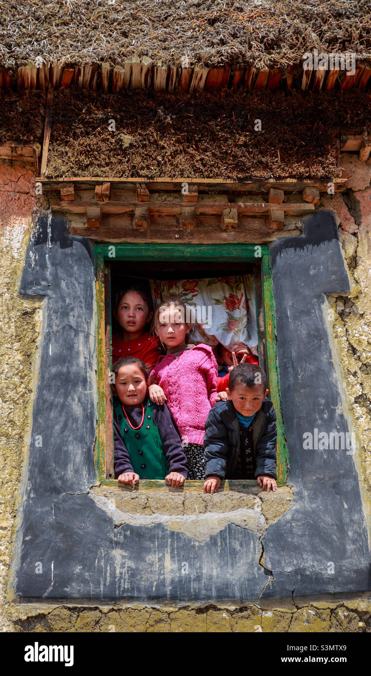 Himalayan kids in  Window - Smartphone Captured Stock Image