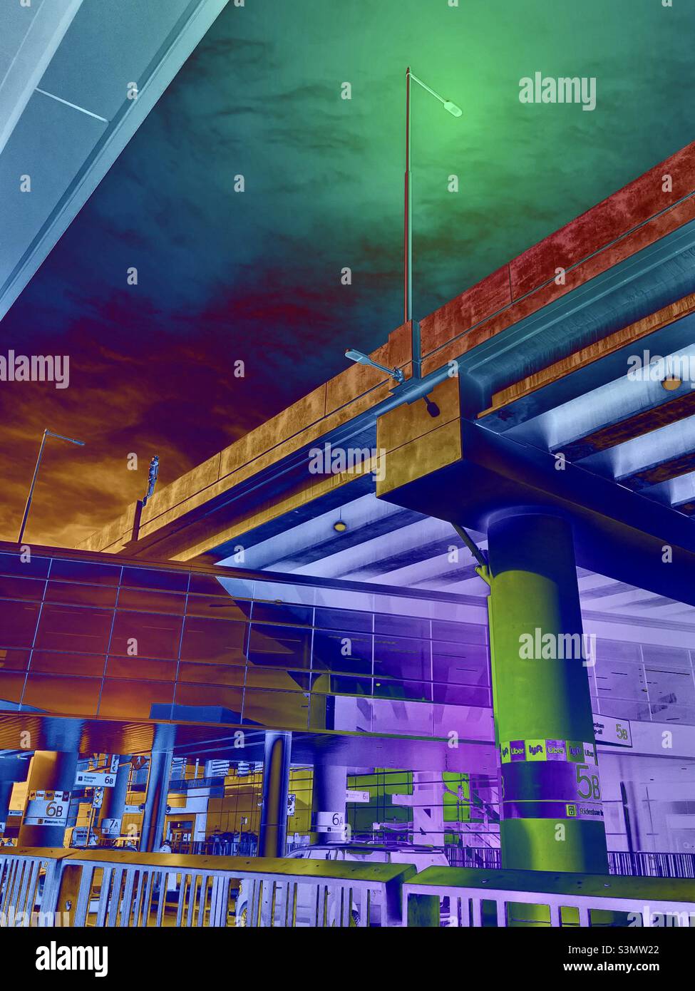 An altered photo of the new Salt Lake City International airport, taken from the passenger pickup area in November 2021. The IOS app Shift was used to create the colorful inverted, or negative, effect - Smartphone Captured Stock Image