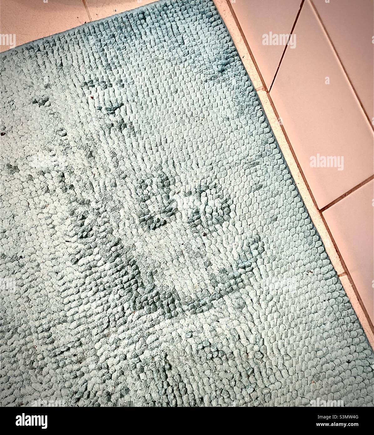 Happy shower floor mat Stock Photo - Alamy