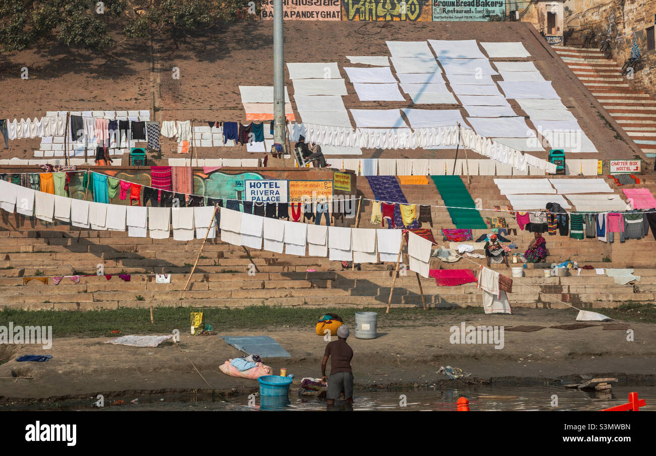 Drying up clothes on the ghats of Ganges near Varanasi, India Stock Photo