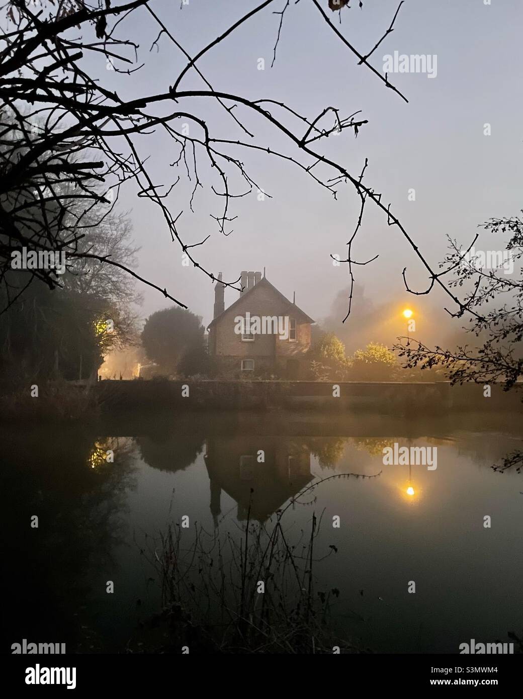 Freezing Cold Morning Moonlight River Ouse Cambridgeshire UK England reflections - Smartphone Captured Stock Image