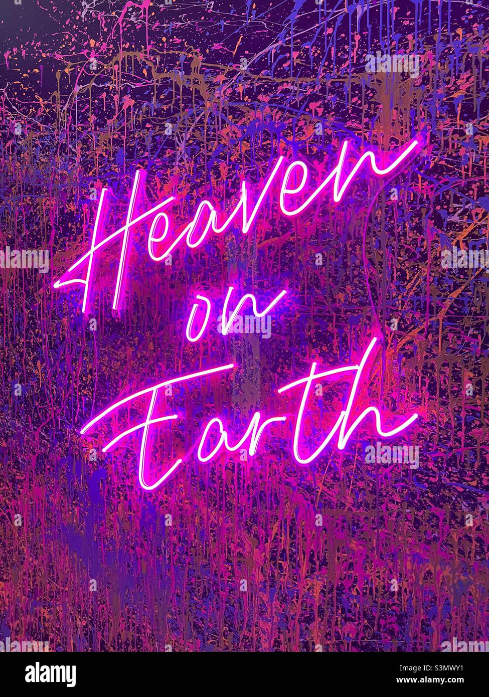 Neon sign Heaven on Earth - Smartphone Captured Stock Image