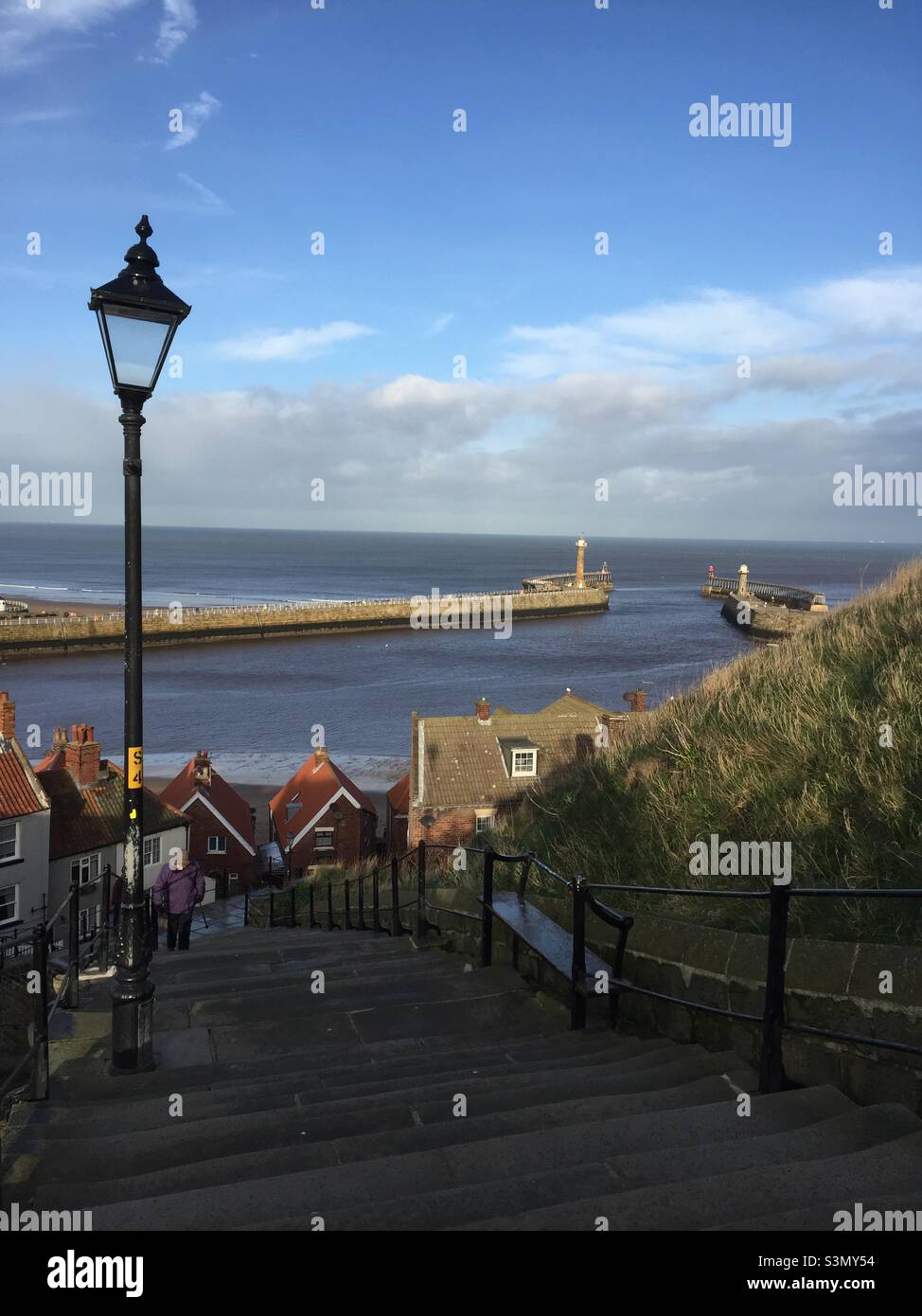 Whitby harbour, North Yorkshire, viewed from the 199 steps leading to the Abbey - Smartphone Captured Stock Image