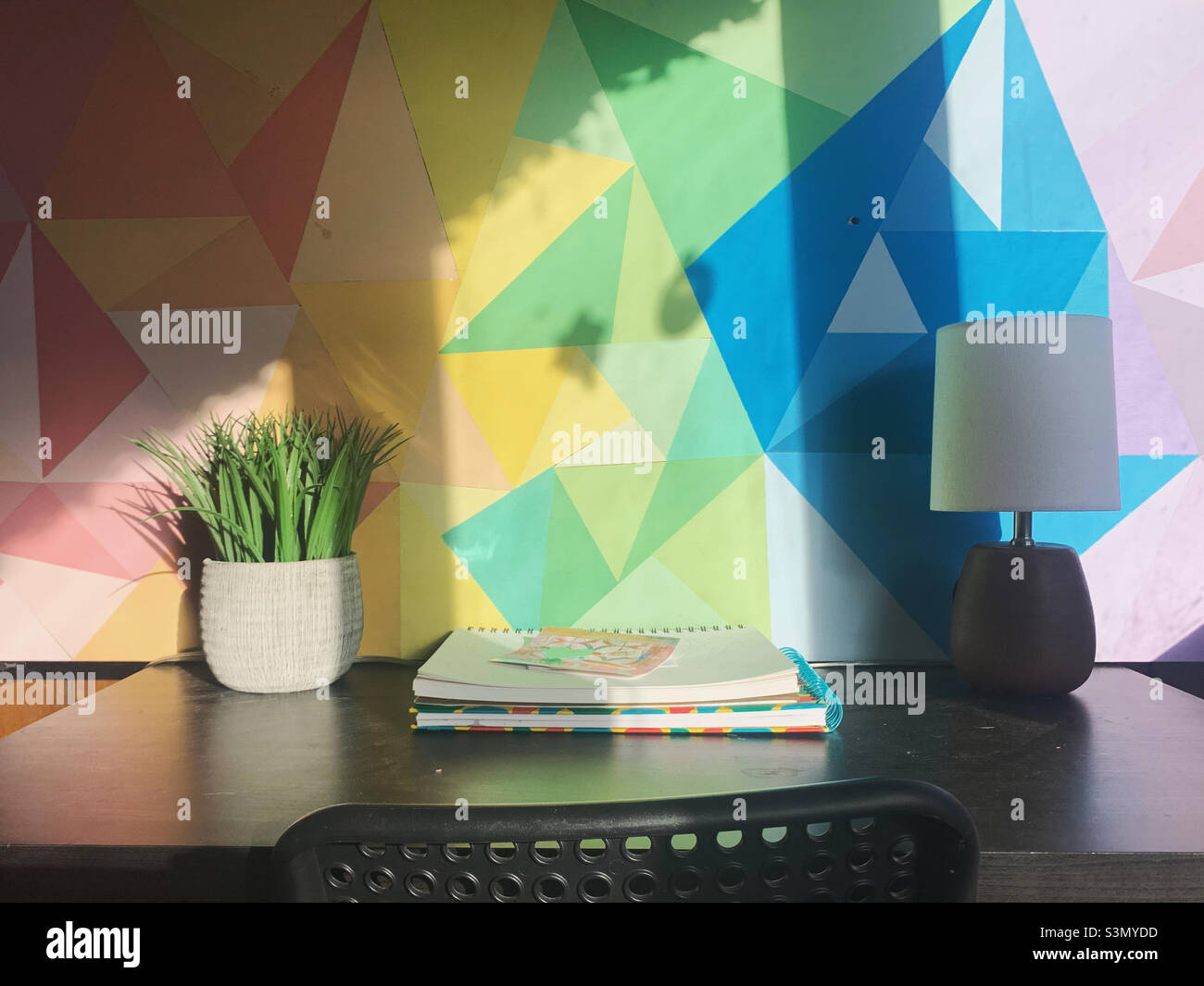 Home office art desk with lamp - Smartphone Captured Stock Image