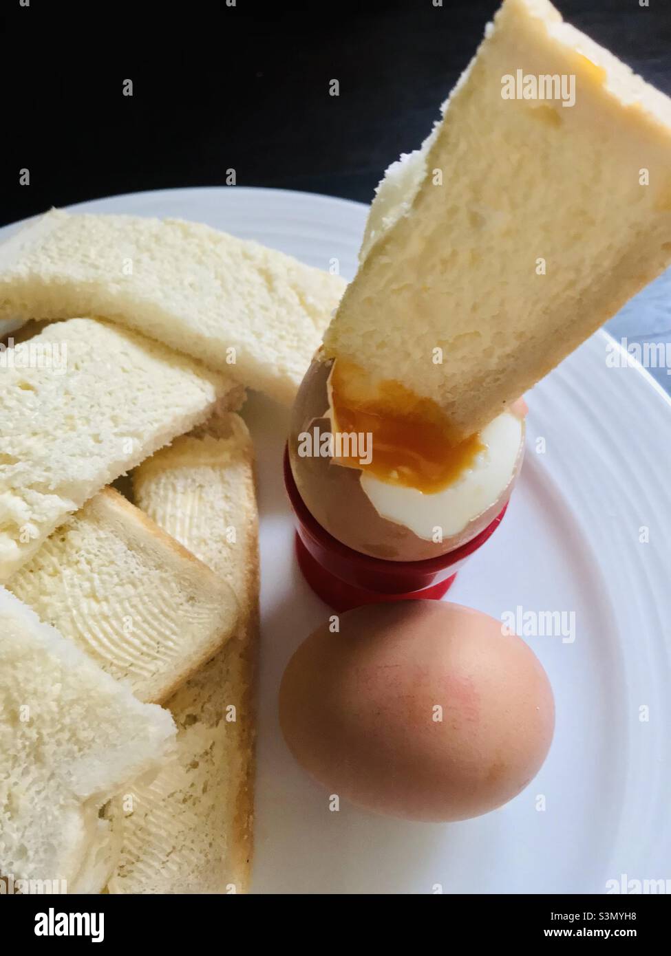 Dippy egg and soldiers Stock Photo Alamy