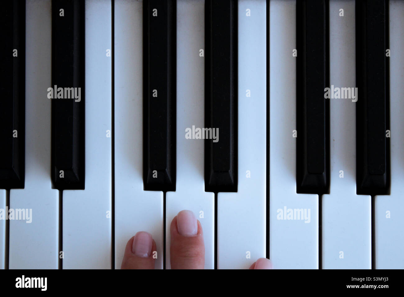 Playing piano - Smartphone Captured Stock Image