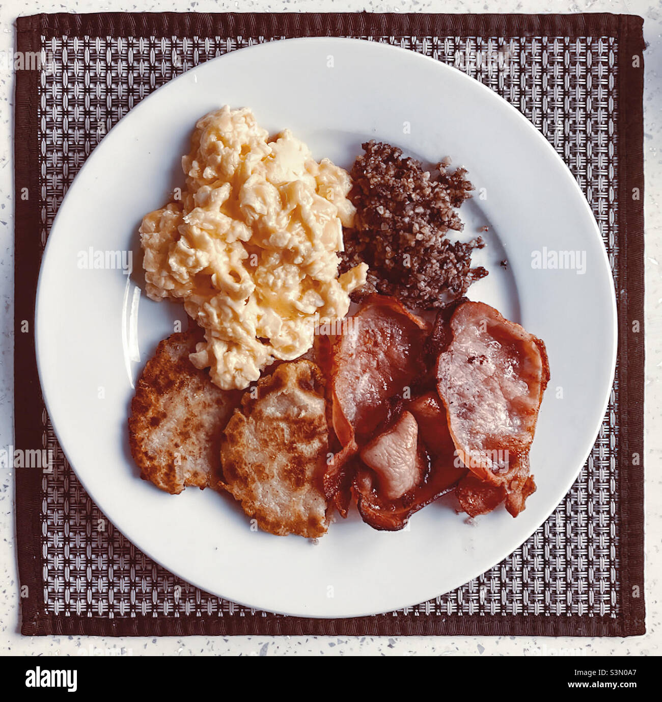 Scottish Breakfast Scrambled Eggs, Bacon, Potato Scones and Haggis