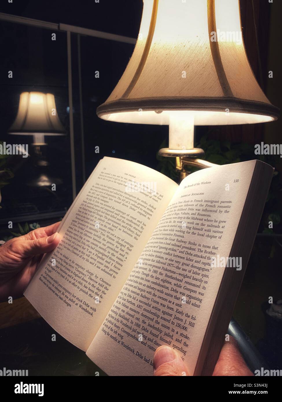 A man reading a book - Smartphone Captured Stock Image