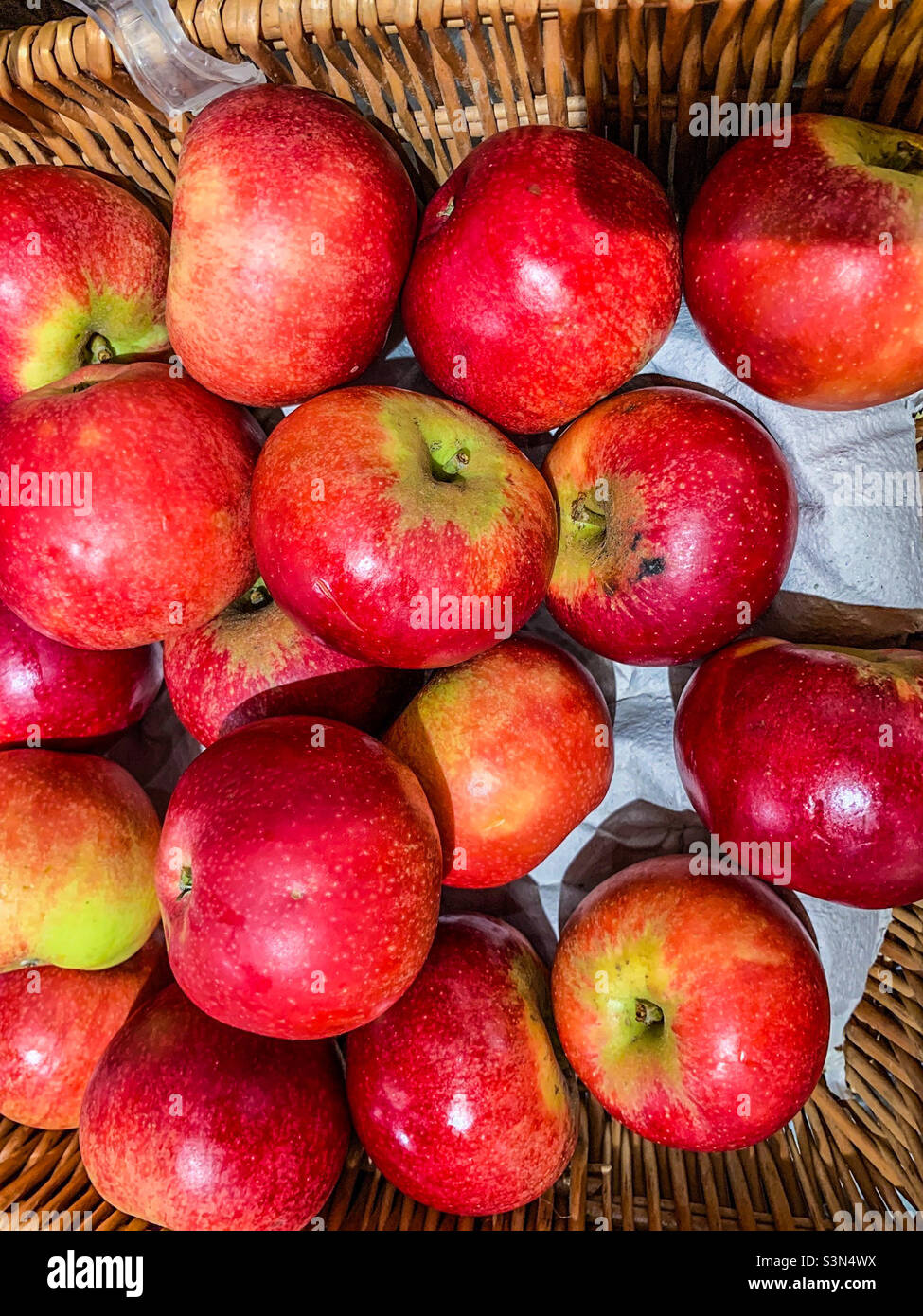 Basket of red Granny Smith apples Stock Photo
