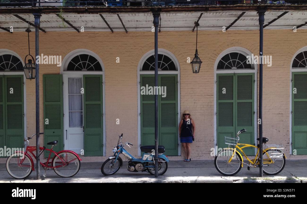 My wife and I were walking through the French Quarter in New Orleans, USA, when I noticed these three primary coloured bikes. They almost seemed staged. - Smartphone Captured Stock Image
