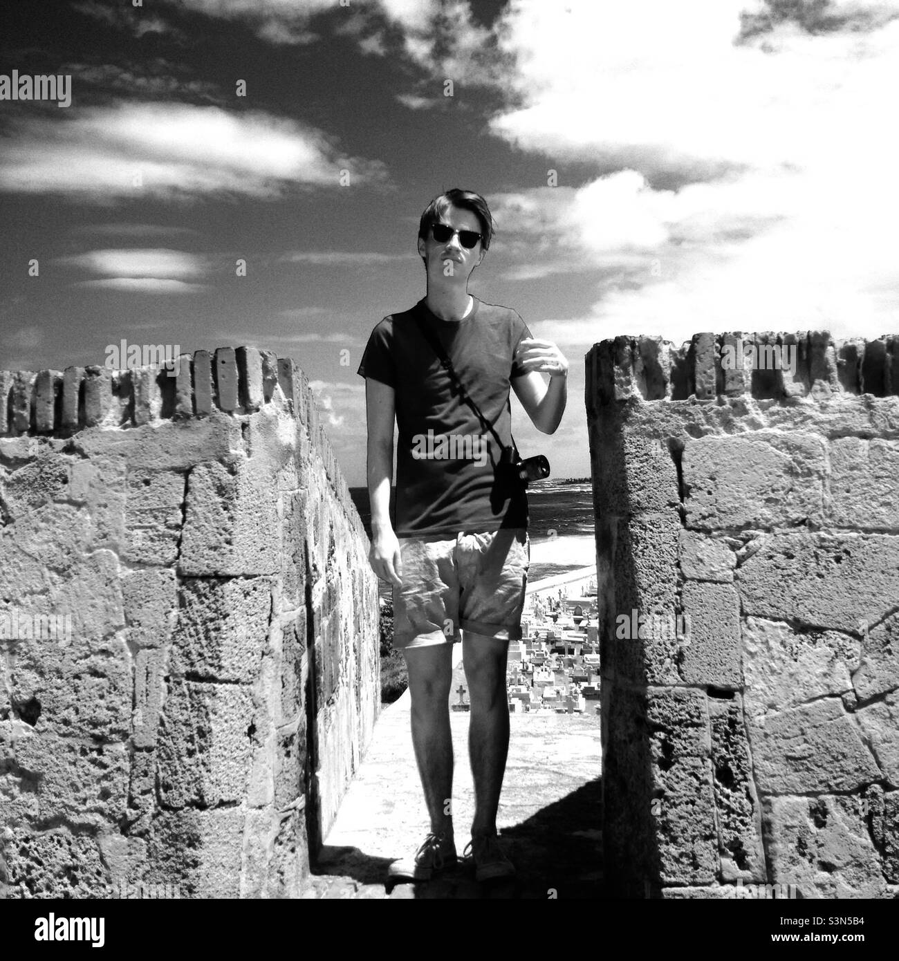 Black and white casual picture of my son at the San Felipe del Morro Castle in San Juan, Puerto Rico. Stock Photo