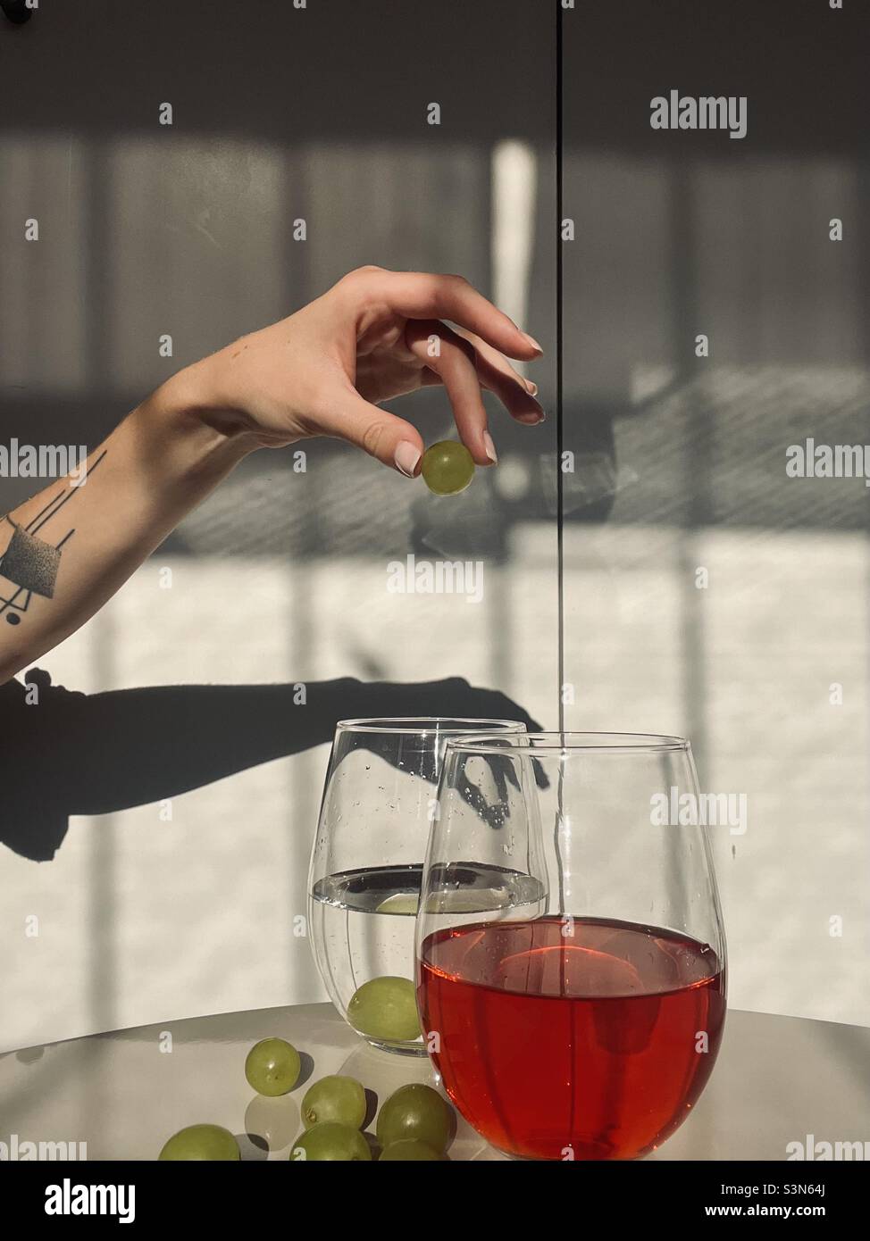 Sunny day. Play. Grapes. Water. Minimalism - Smartphone Captured Stock Image