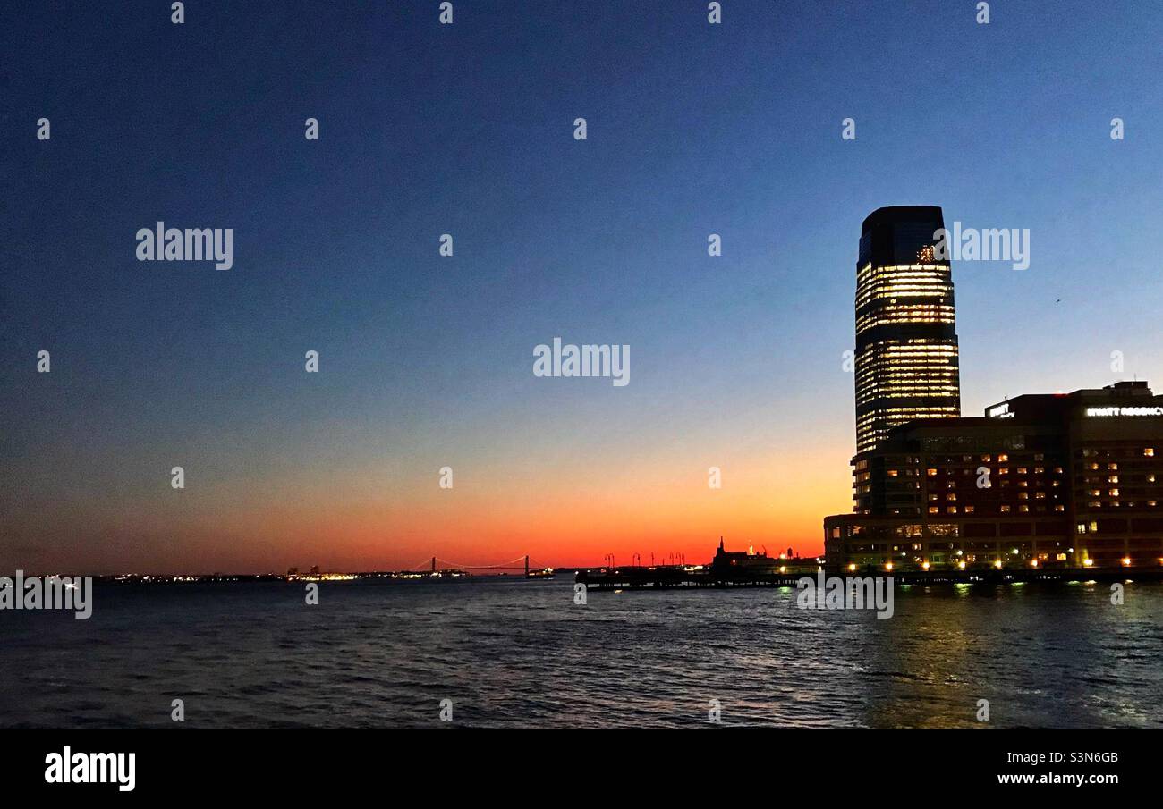 Sunset over the New York harbor Stock Photo