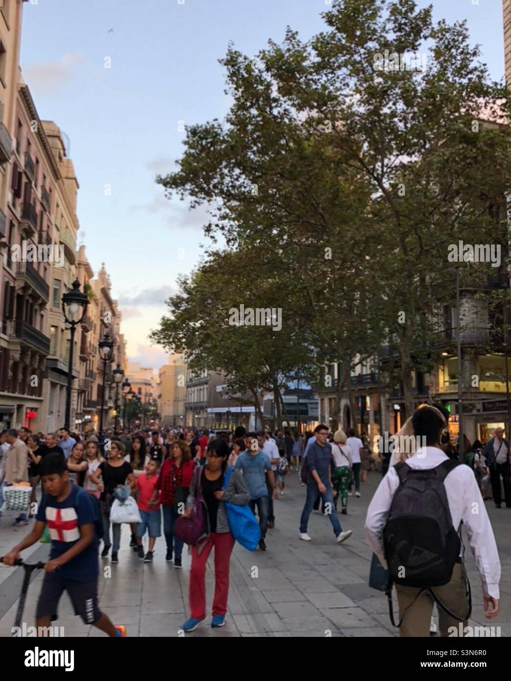Street scene Barcelona Spain shoppers Stock Photo