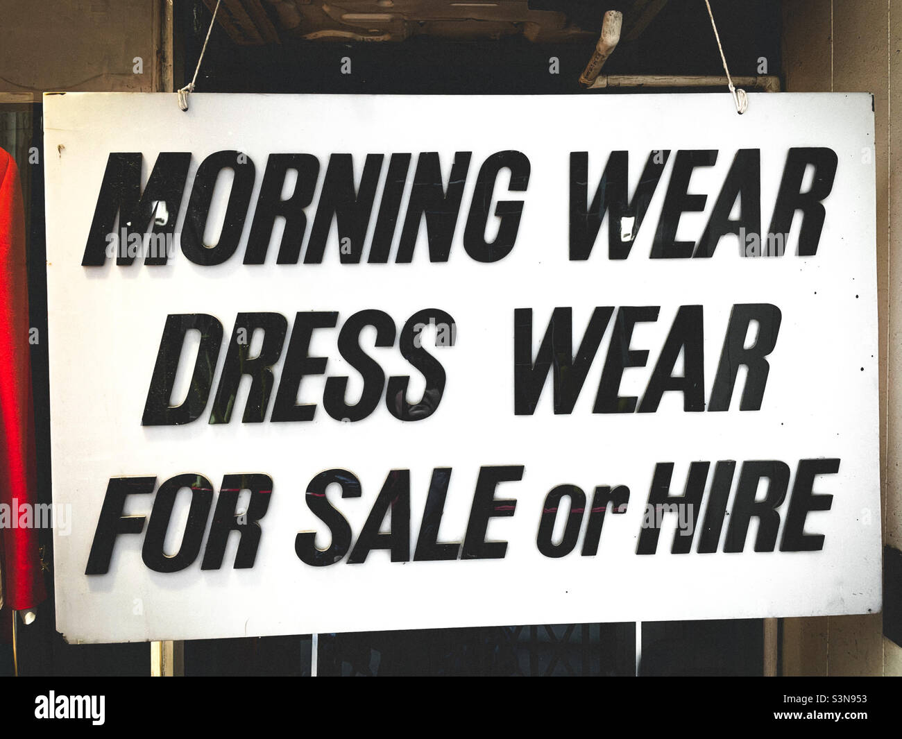 Old fashioned clothes shop sign - Smartphone Captured Stock Image