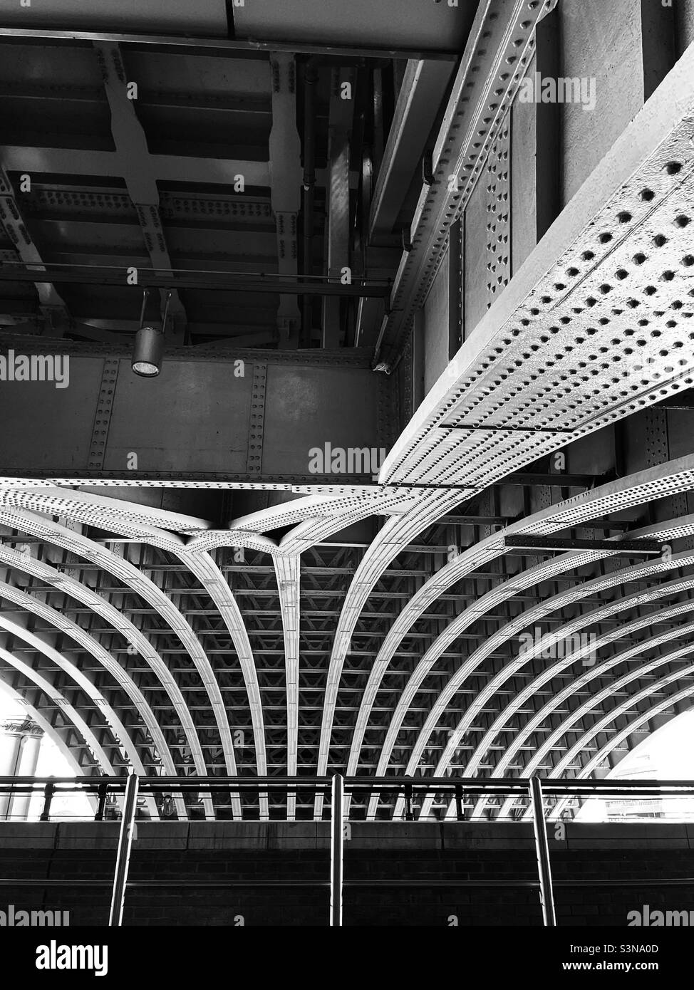 Underneath of bridge over Thames, London - Smartphone Captured Stock Image