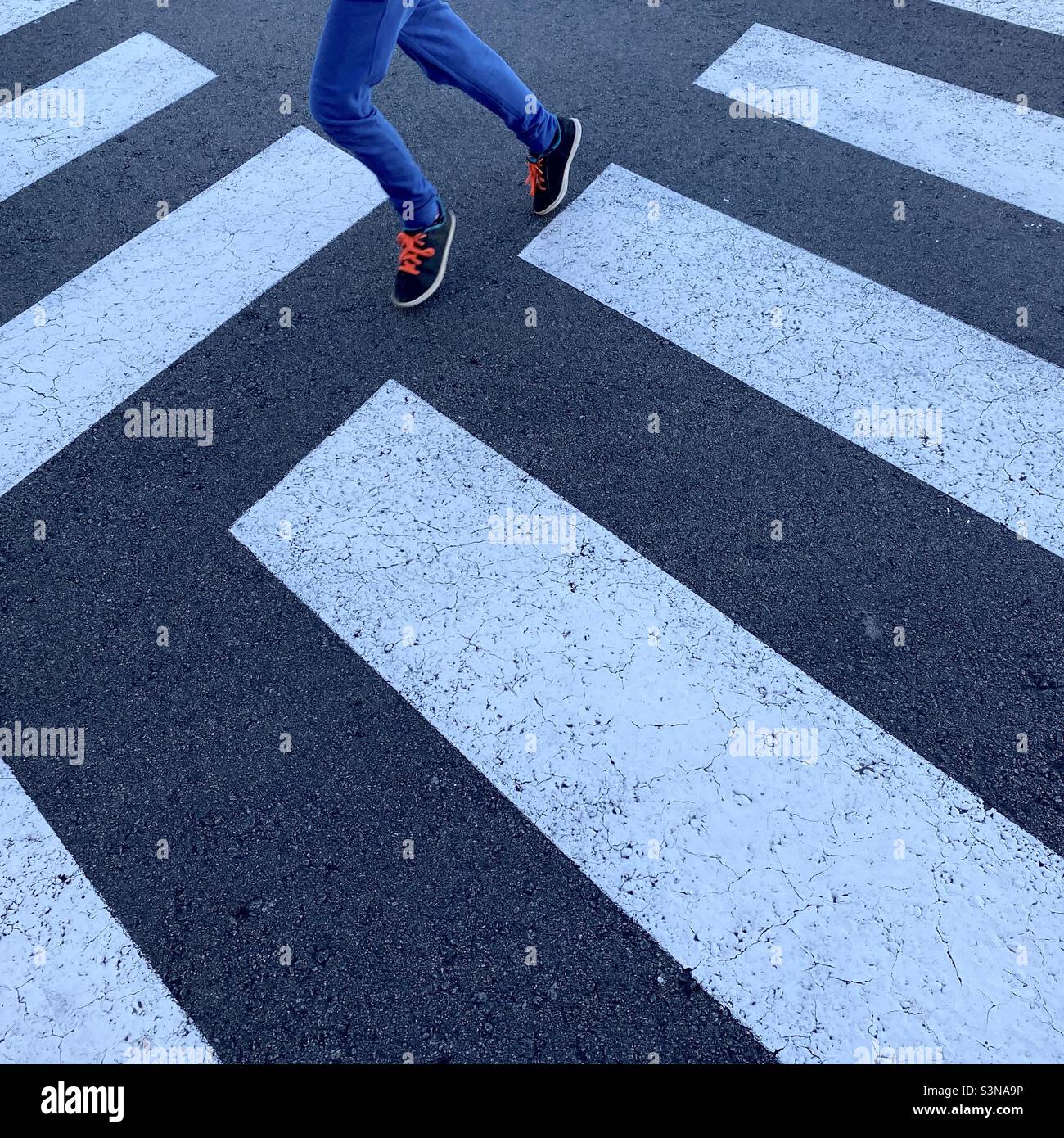 Zebra crossings and legs - Smartphone Captured Stock Image