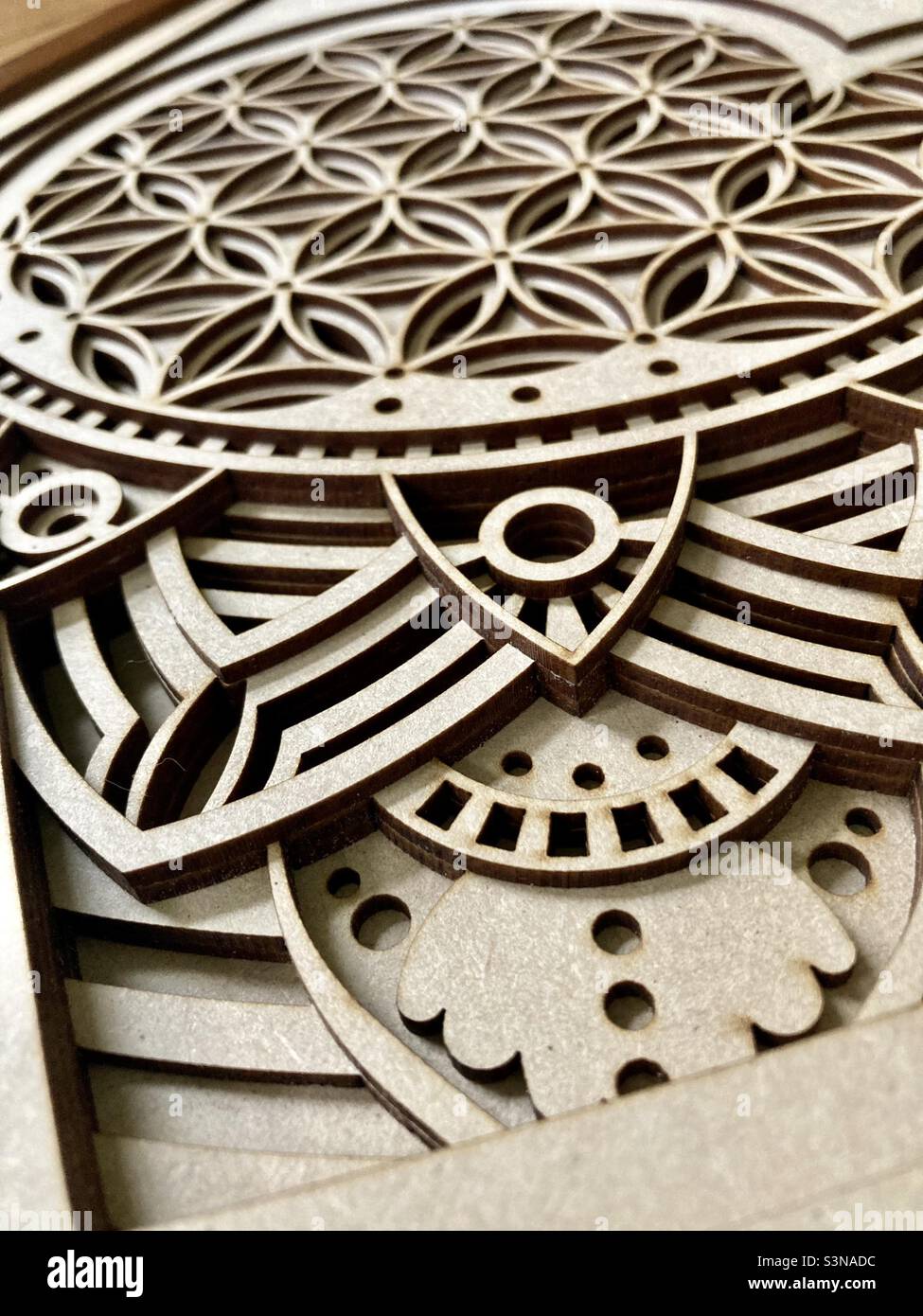 Intricate 3D wooden art design closeup Stock Photo