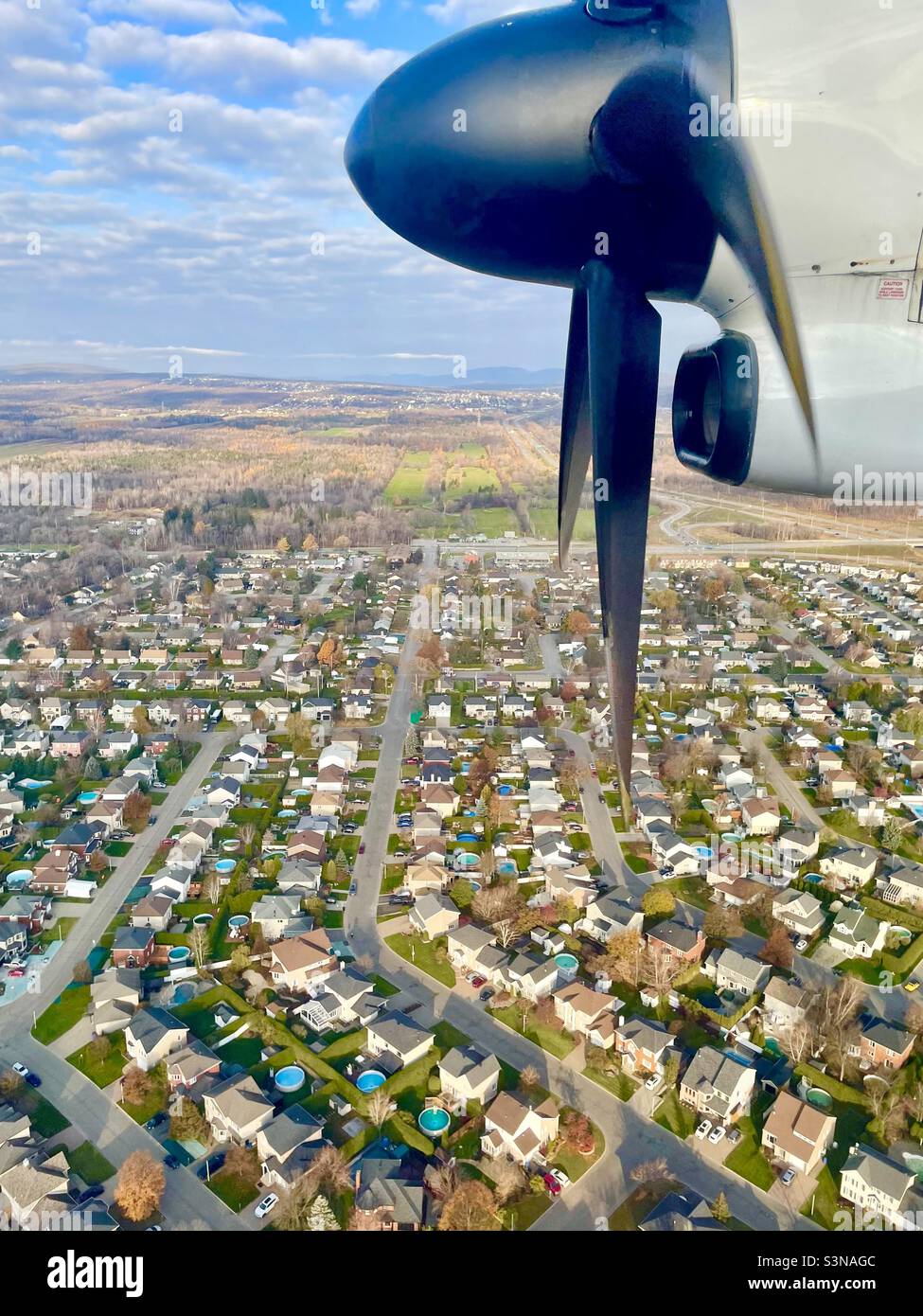 Air travel, city from high above - Smartphone Captured Stock Image