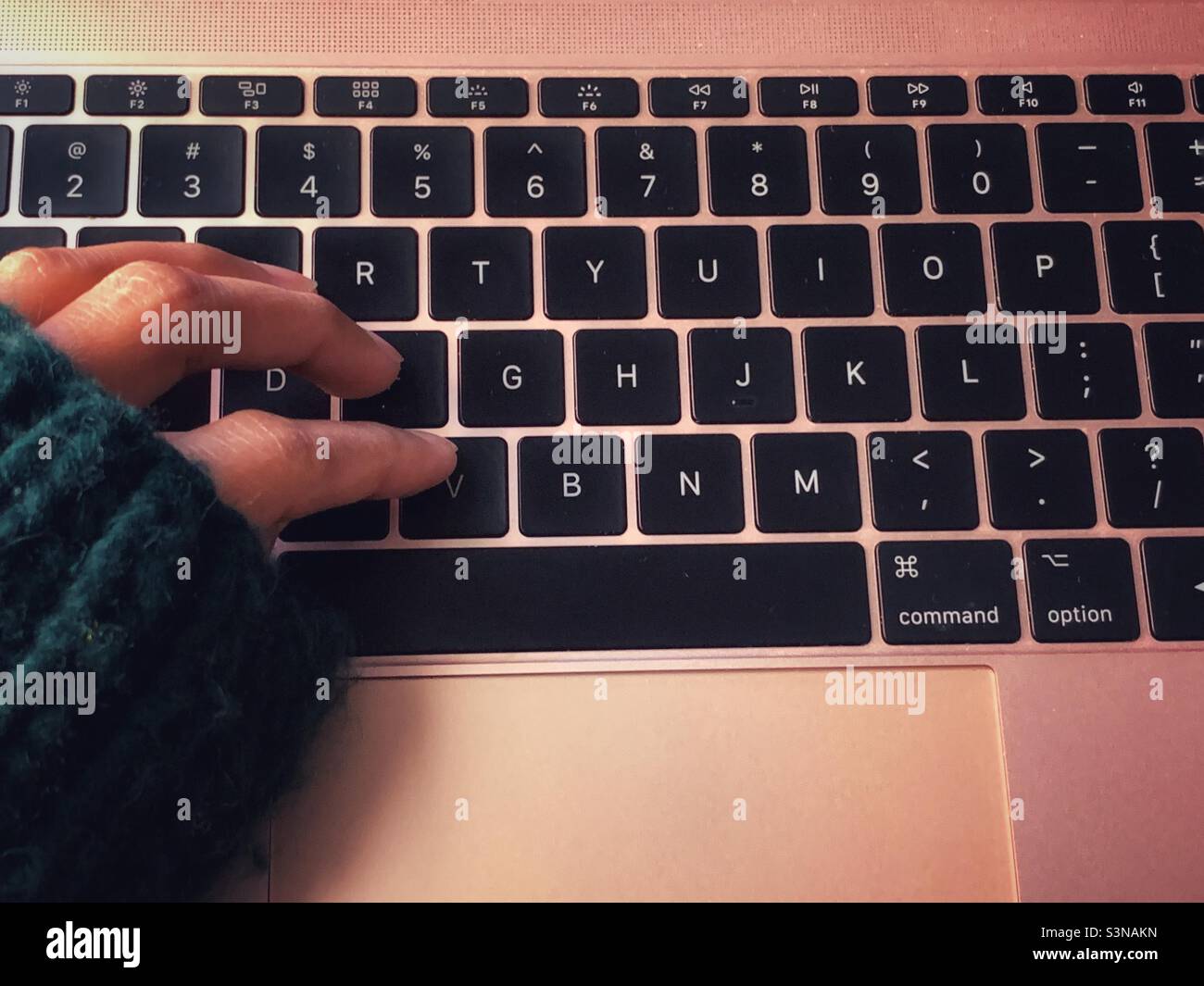 A woman starting typing using one hand - Smartphone Captured Stock Image