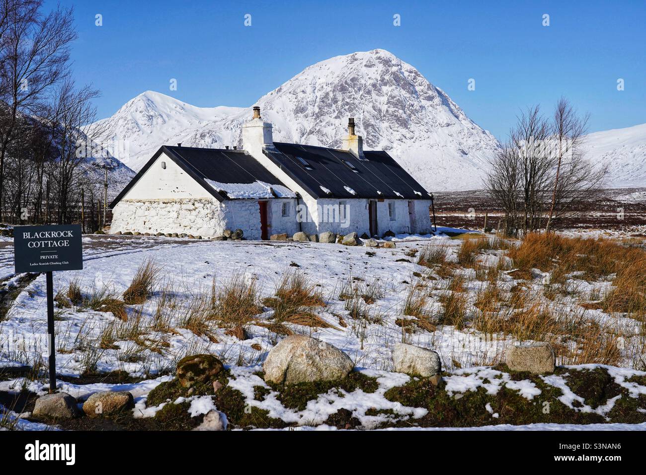 Blackrock Cottage and Munro mountain Stob Dearg Buachaille Etive Mor covered in fresh snow, Rannoch Moor Scotland - Smartphone Captured Stock Image