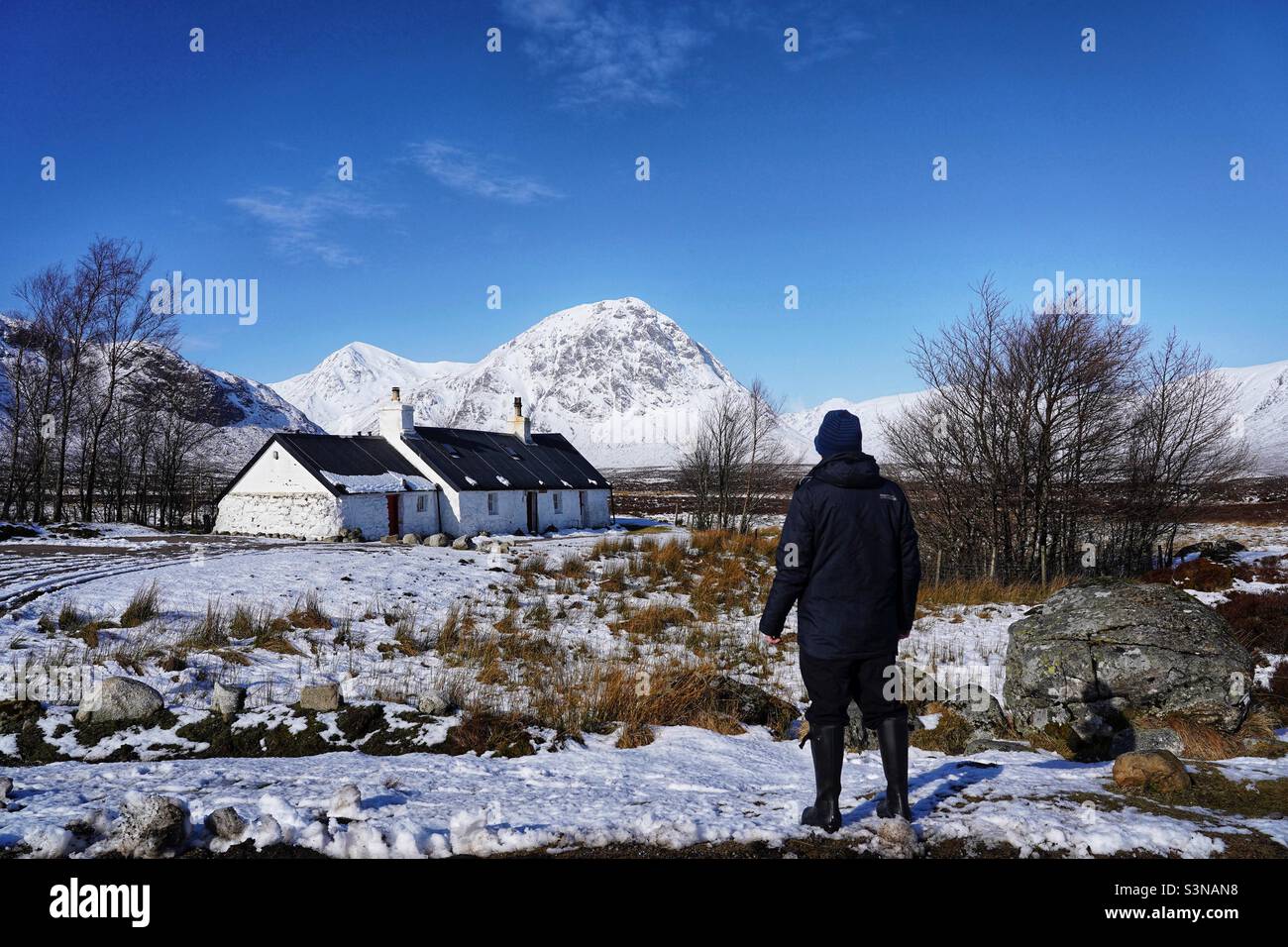 Blackrock Cottage and munro mountain Stob Dearg Buachaille Etive Mor, Scotland - Smartphone Captured Stock Image
