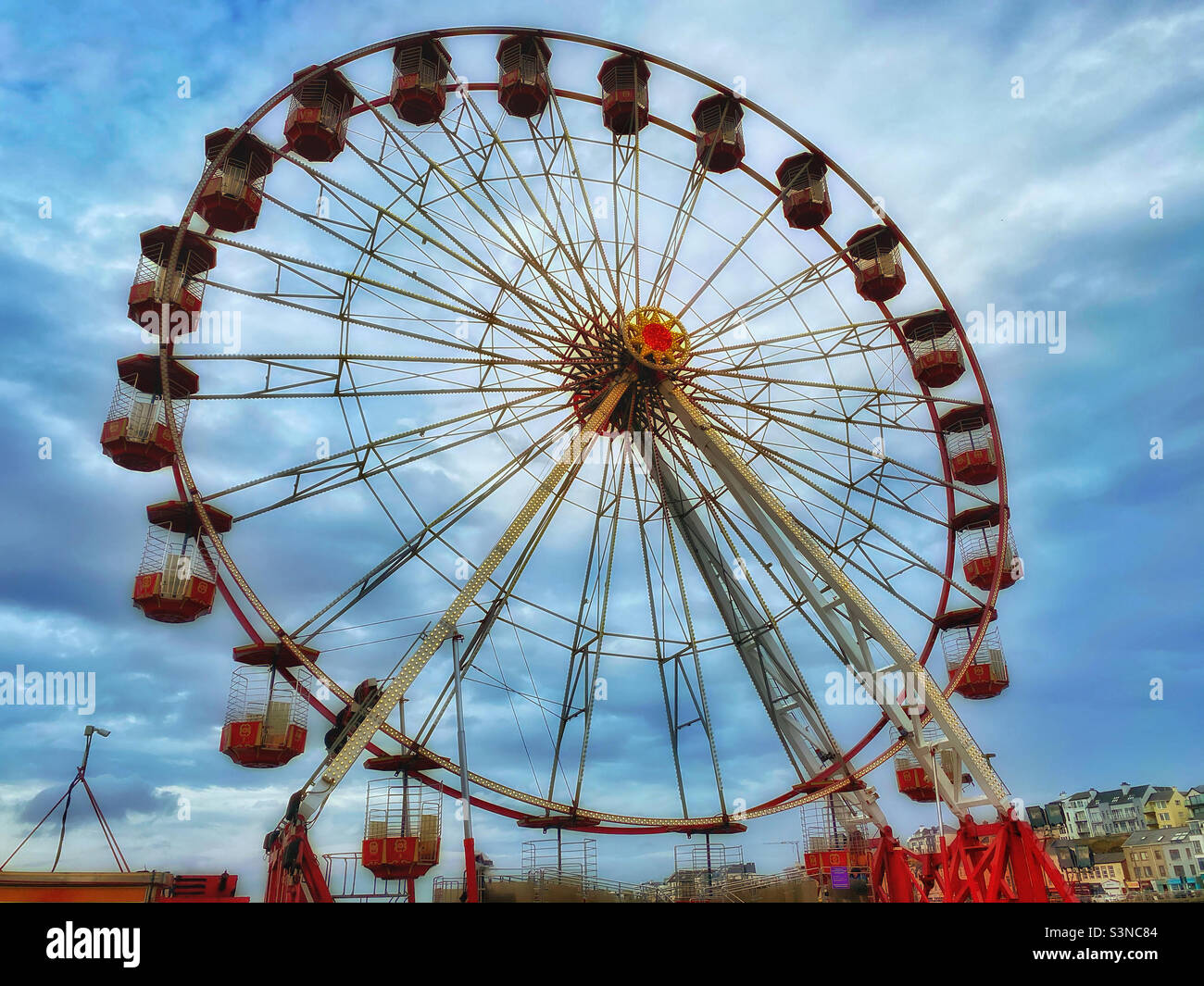 A Ferris Wheel. Fun times or do you just feel like you are going round in circles? Photo ©️ COLIN HOSKINS. - Smartphone Captured Stock Image