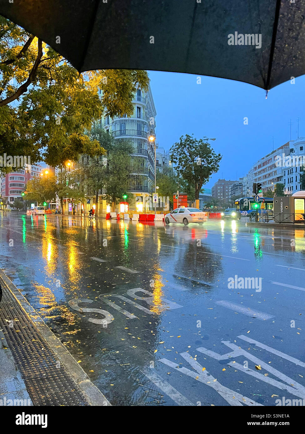 Alcala street in a raíny night. Madrid, Spain. - Smartphone Captured Stock Image