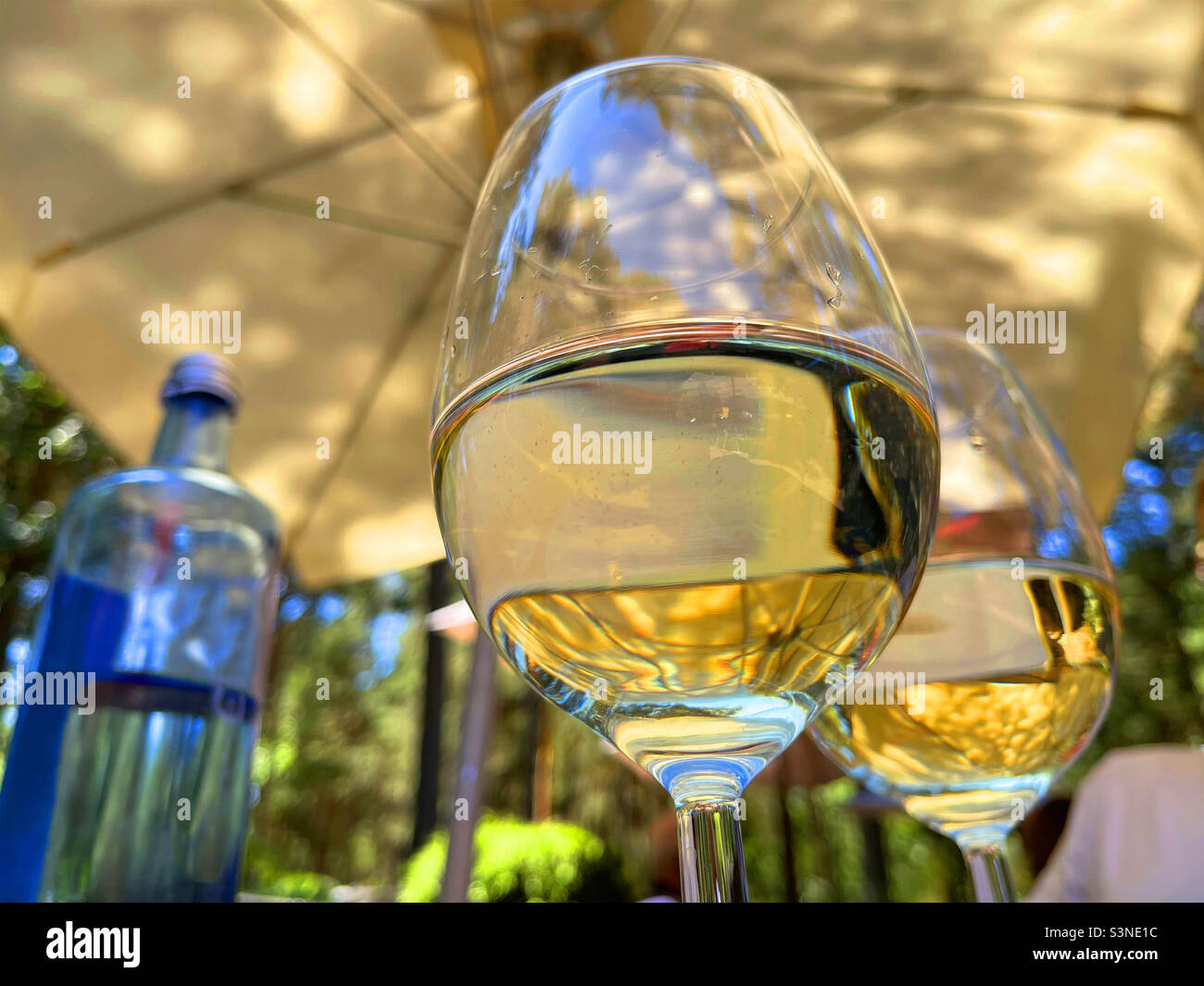 Glasses of white wine. Close view. - Smartphone Captured Stock Image
