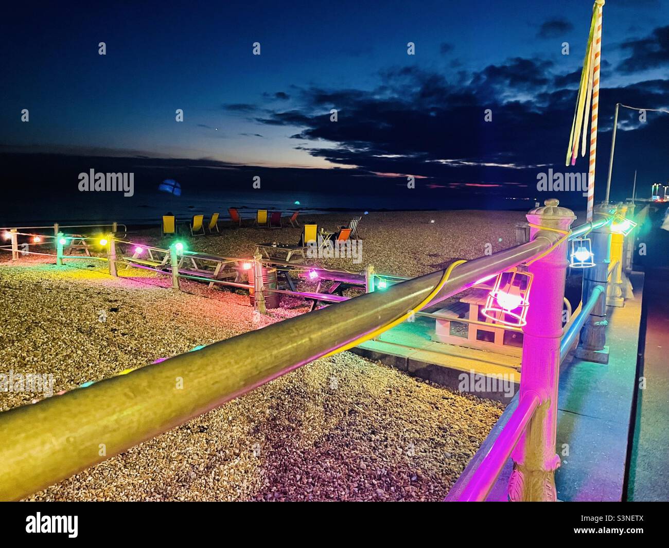 Beach lights at nighttime Stock Photo Alamy