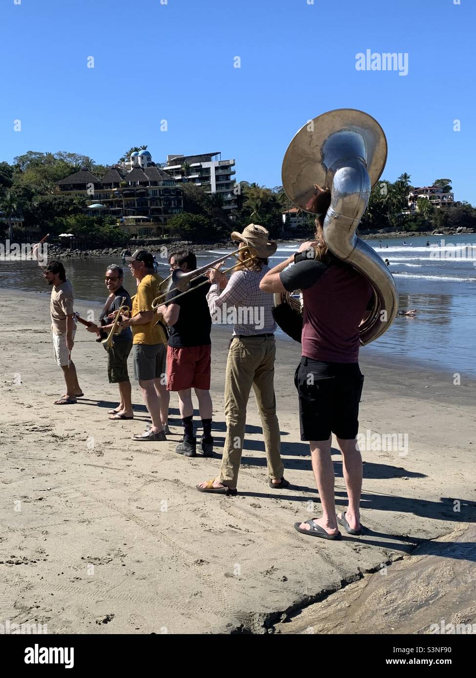 Brass band playing music on sayulita beach Mexico Stock Photo - Alamy
