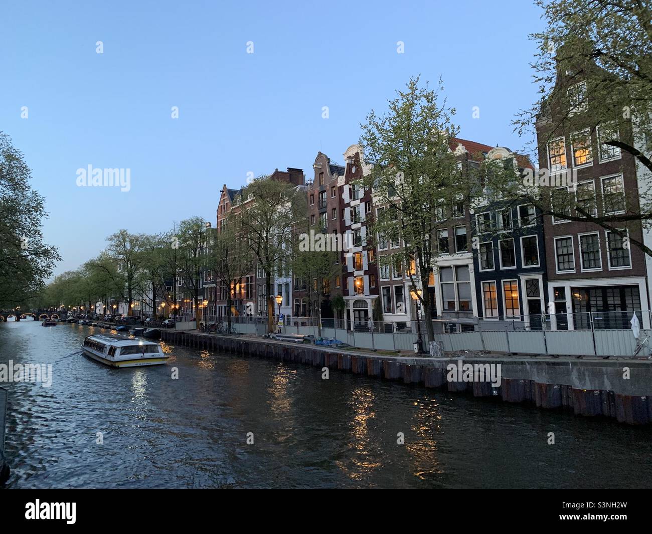 Blue hour after sunset in Canal Belt, Amsterdam, Netherlands, Europe - Smartphone Captured Stock Image