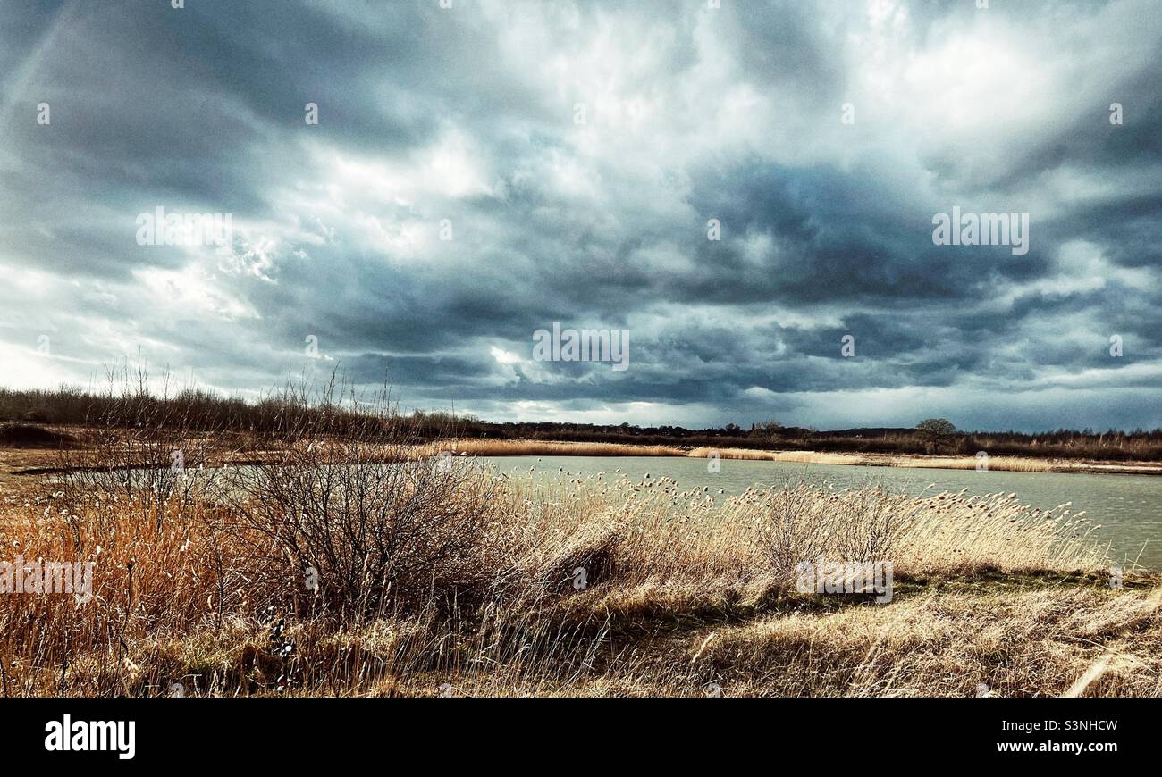 Stormy skies over a lake Stock Photo