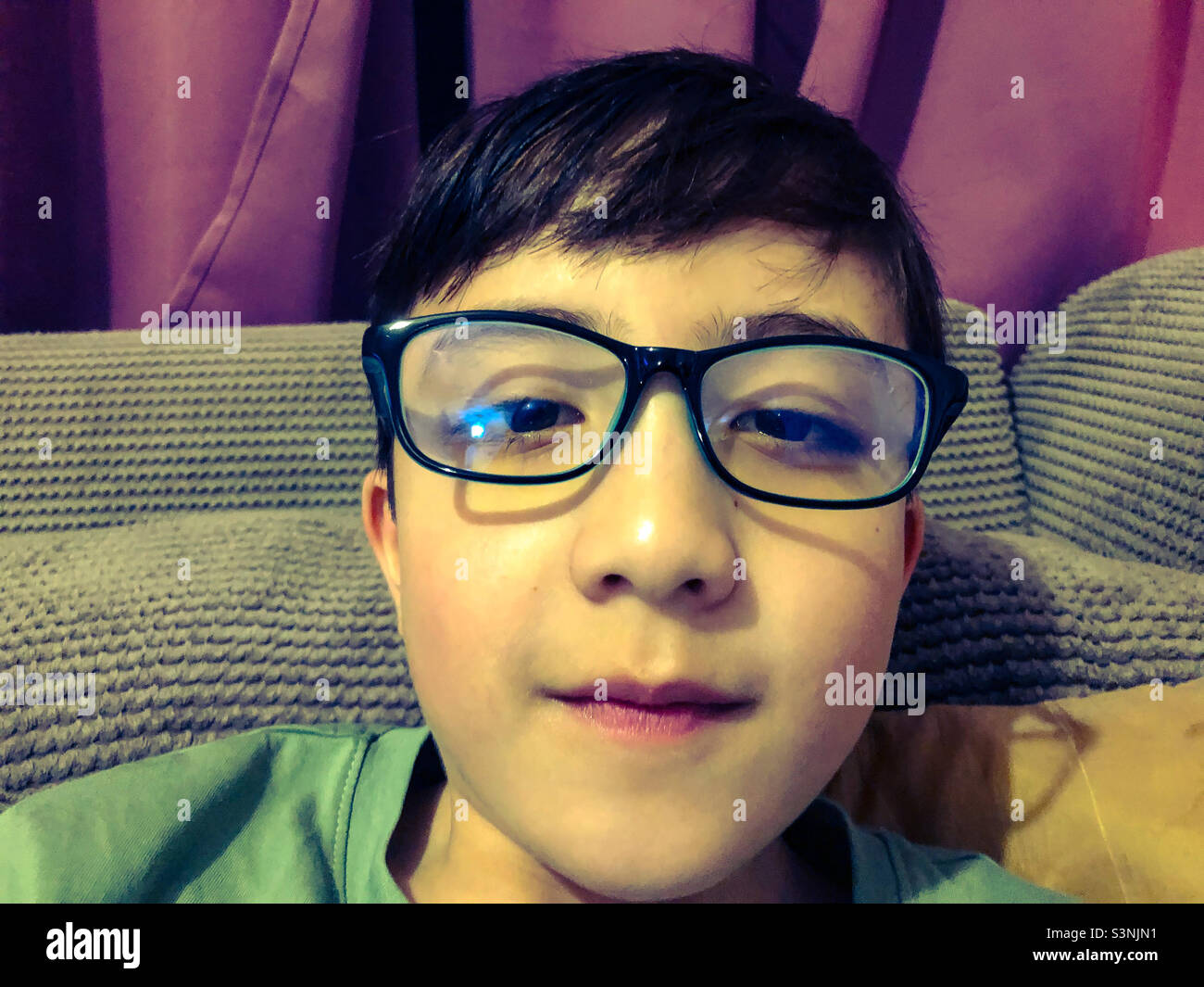 Portrait of a boy wearing glasses Stock Photo Alamy