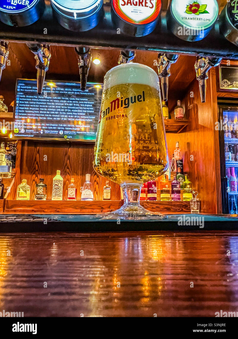 Refreshing pint of San Miguel lager on a bar - Smartphone Captured Stock Image