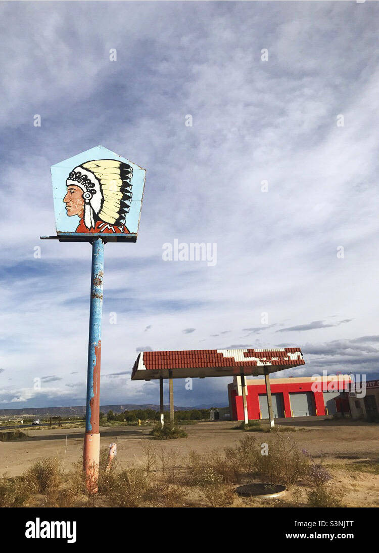 Old gas station with Native American sign in New Mexico Stock Photo Alamy