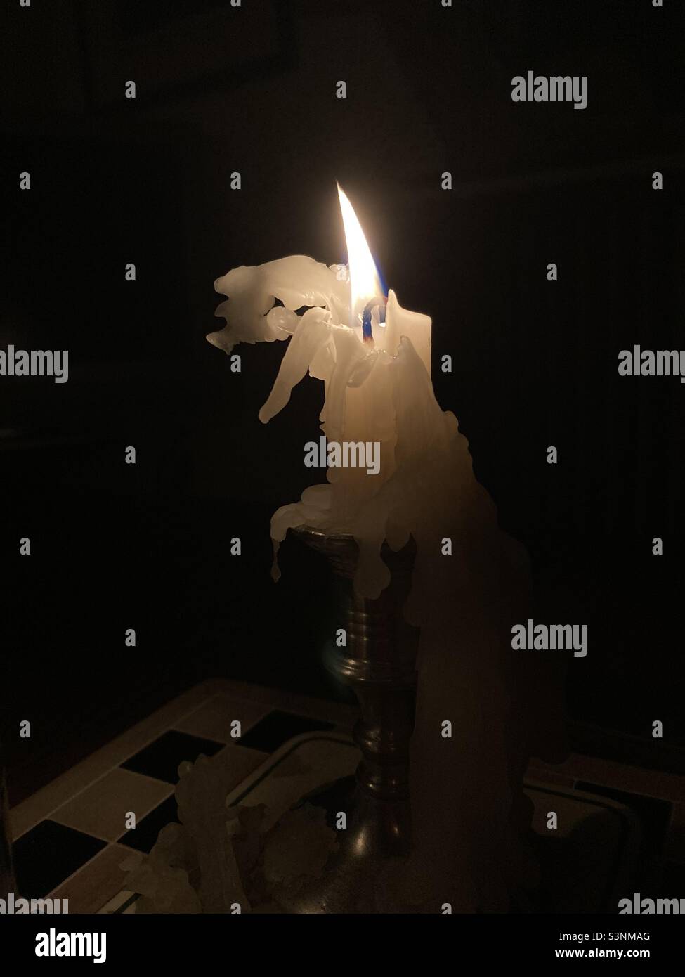Candlelight during a power cut - Smartphone Captured Stock Image