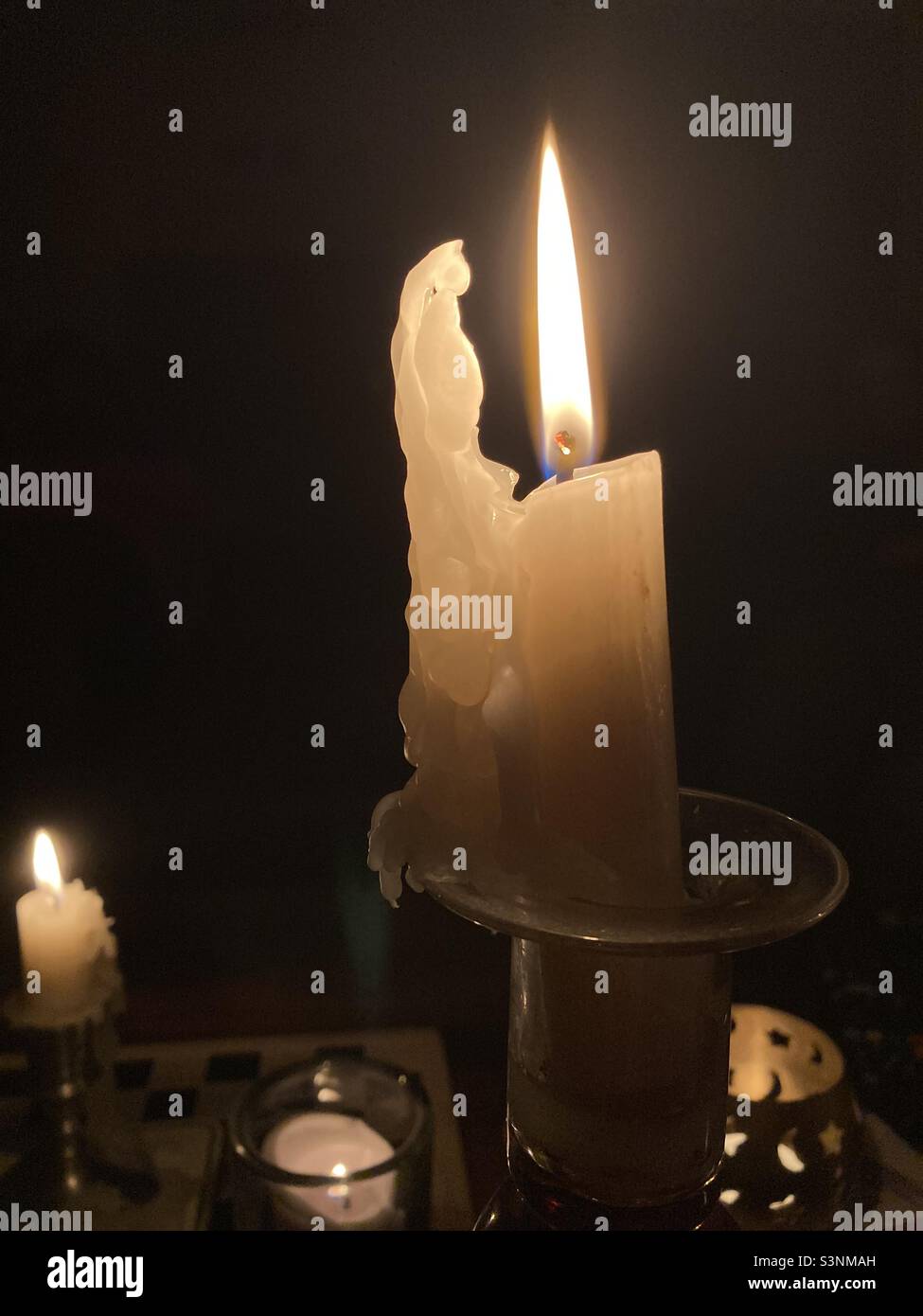 Candlelight during a power cut - Smartphone Captured Stock Image